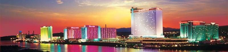 Dusk skyline of Laughlin, NV along the shore of the Colorado River. FNL vacation charters.