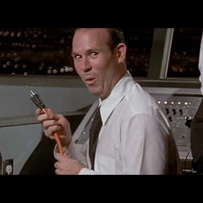 image of Johnny character from movie Airplane! Holding a pulled plug for Air Traffic Control