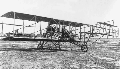 black and white image of a bi-plane